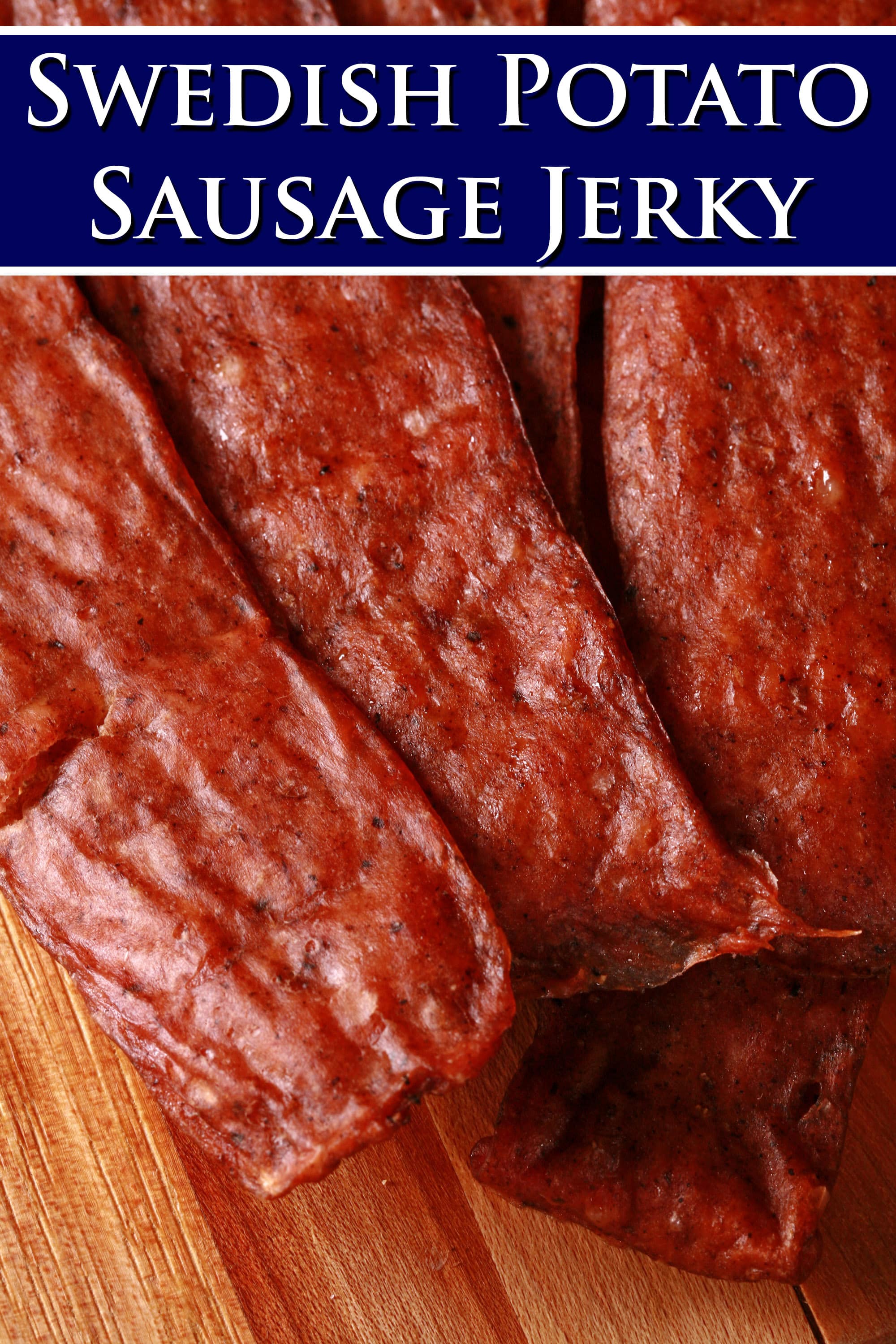 Several strips of swedish potato sausage ground chicken jerky on a cutting board. Overlaid text says swedish potato sausage jerky.
