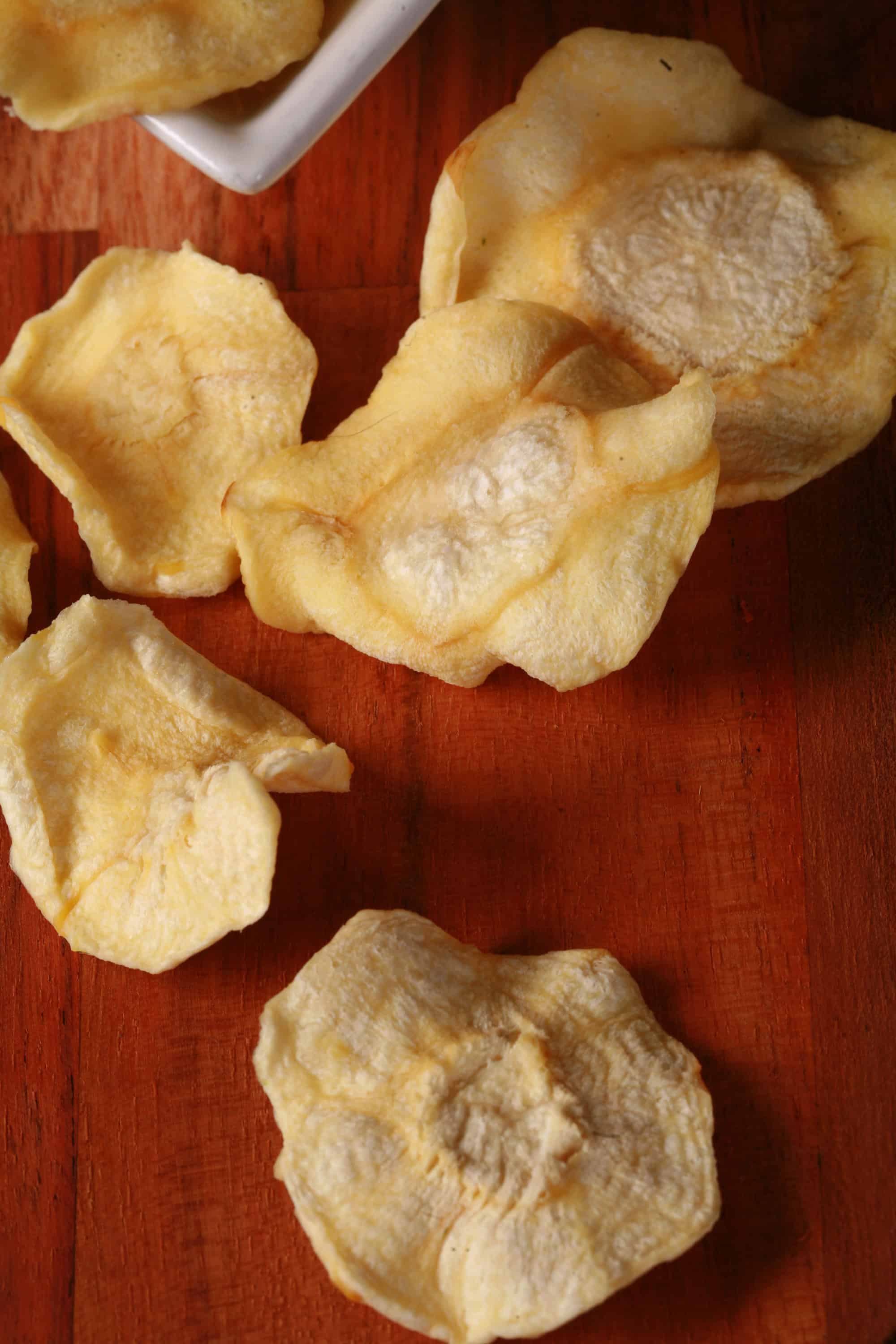 A bowl of crunchy dried parsnip chips.