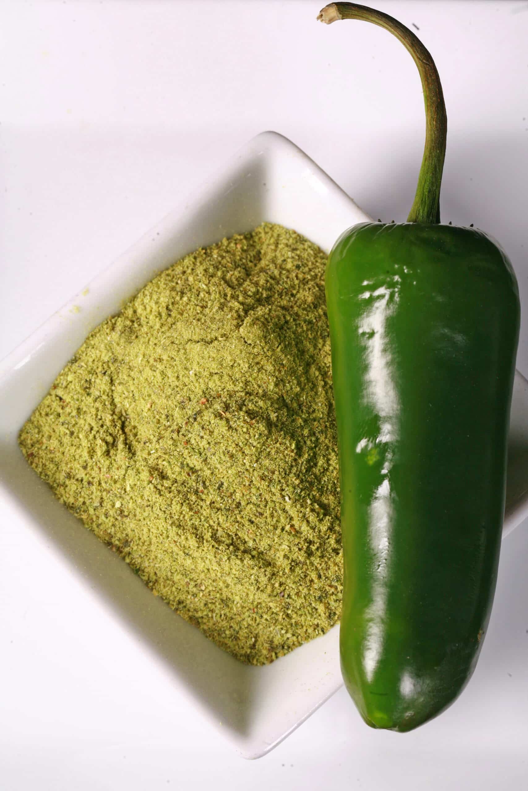 A small bowl of homemade jalapeno powder.