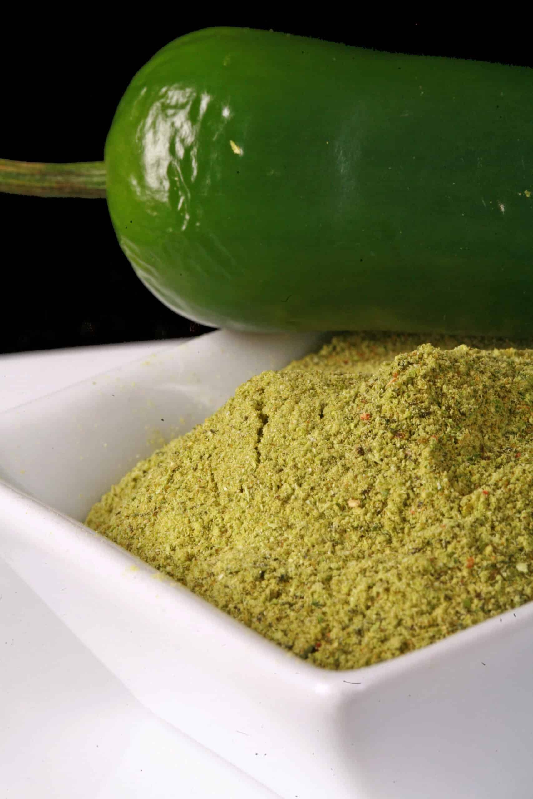 A small bowl of powdered jalapeno peppers.